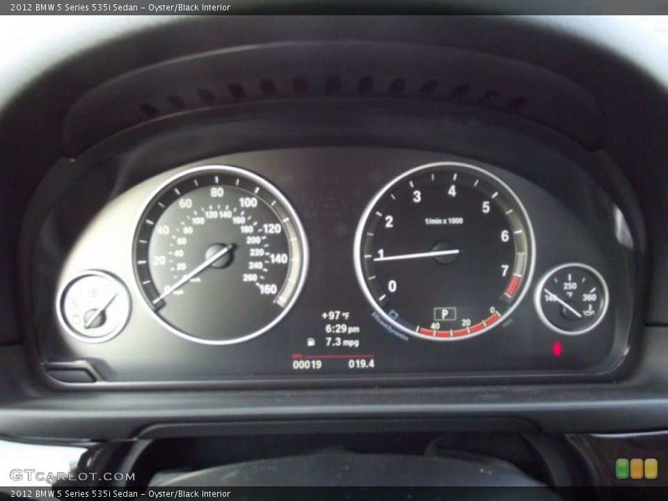 Oyster/Black Interior Gauges for the 2012 BMW 5 Series 535i Sedan #69239835