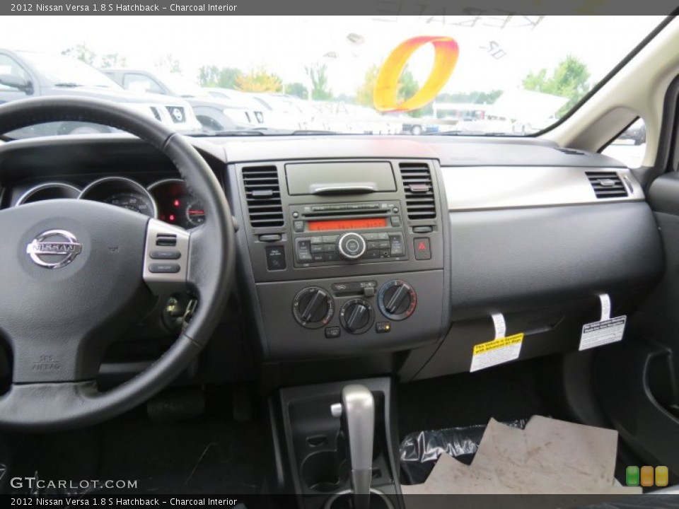 Charcoal Interior Dashboard for the 2012 Nissan Versa 1.8 S Hatchback #69247956