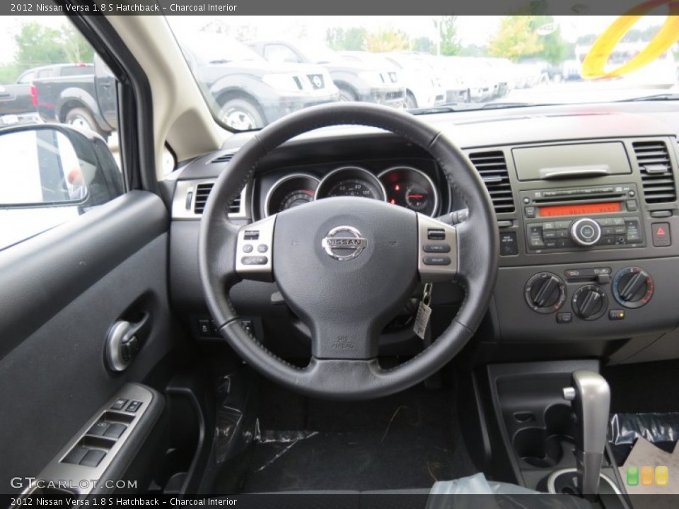 Charcoal Interior Steering Wheel for the 2012 Nissan Versa 1.8 S Hatchback #69247965