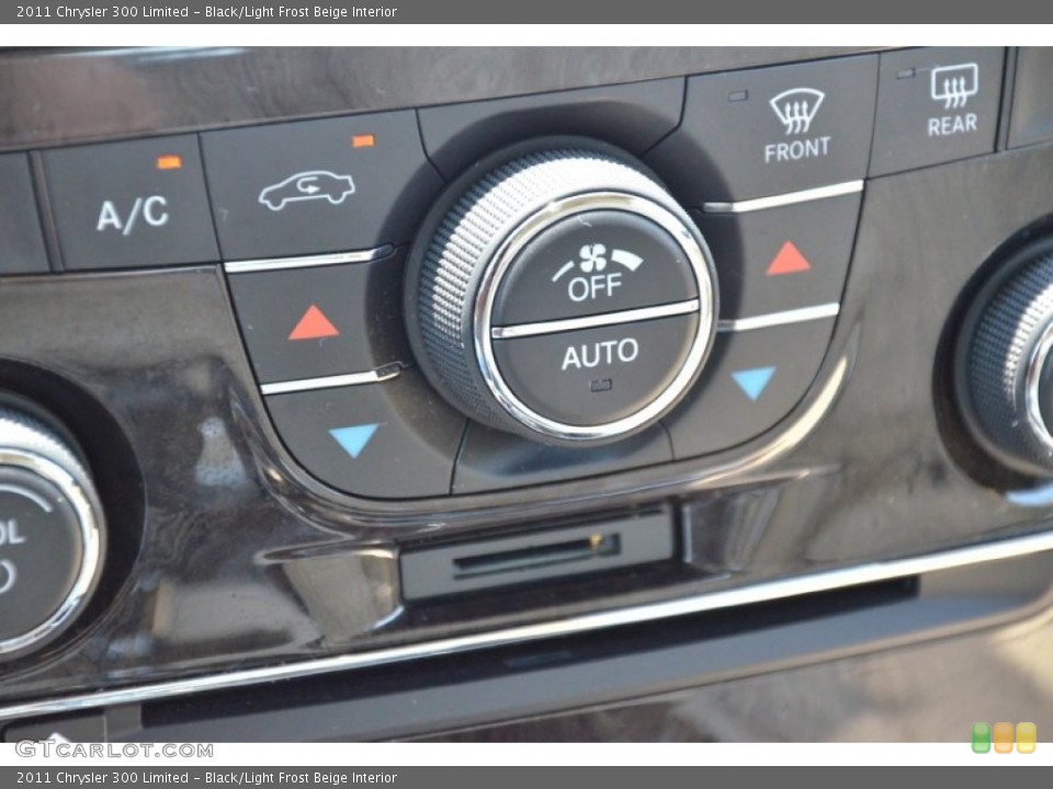 Black/Light Frost Beige Interior Controls for the 2011 Chrysler 300 Limited #69269700