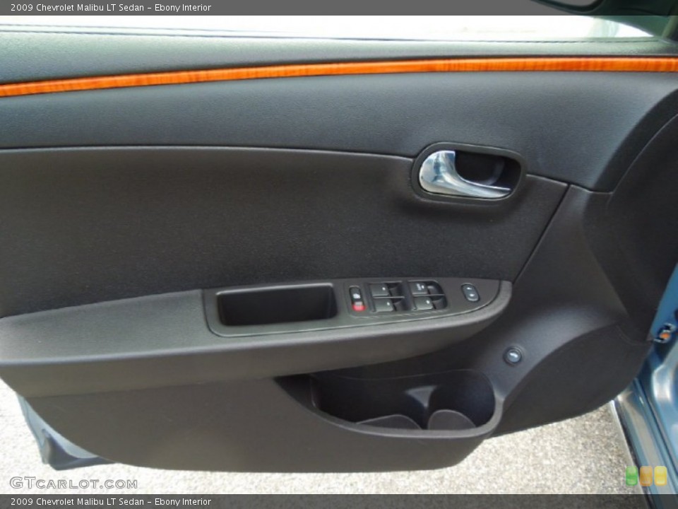 Ebony Interior Door Panel for the 2009 Chevrolet Malibu LT Sedan #69278745