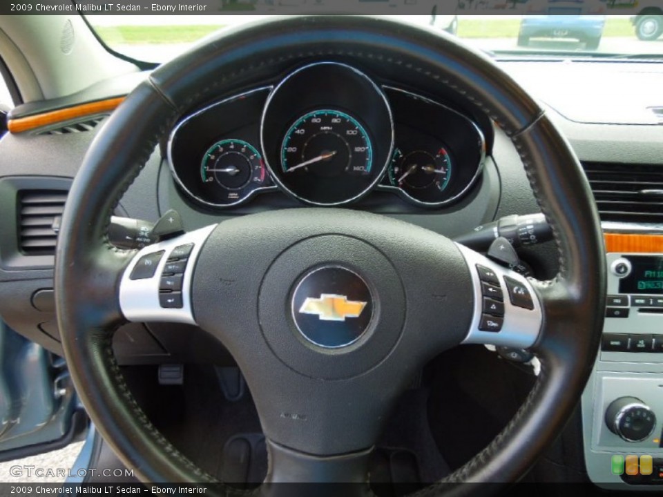 Ebony Interior Steering Wheel for the 2009 Chevrolet Malibu LT Sedan #69278781
