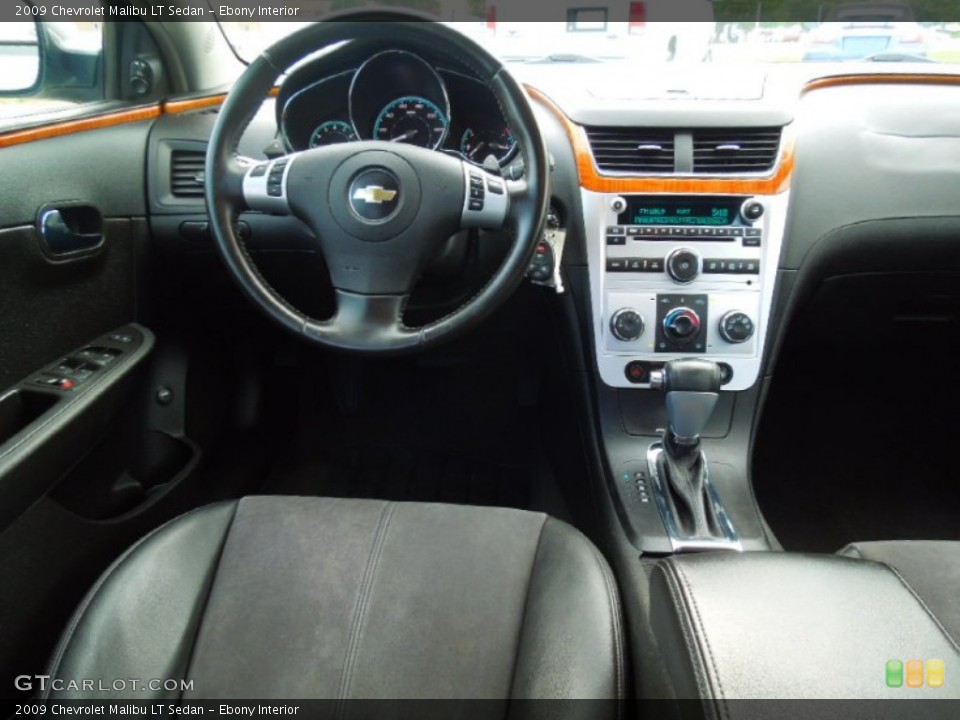 Ebony Interior Dashboard for the 2009 Chevrolet Malibu LT Sedan #69278808