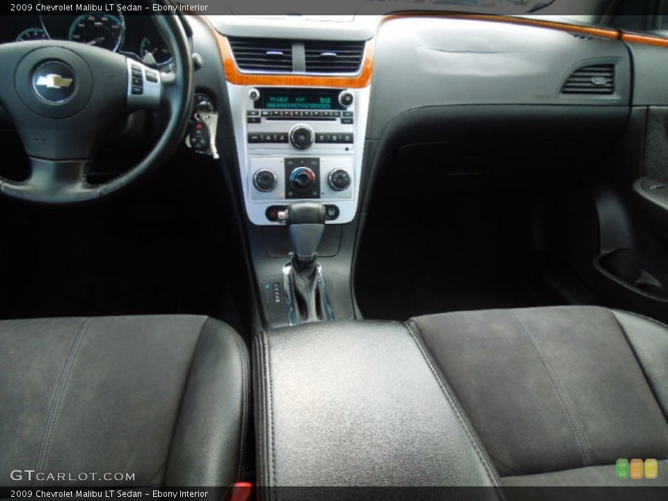 Ebony Interior Dashboard for the 2009 Chevrolet Malibu LT Sedan #69278817