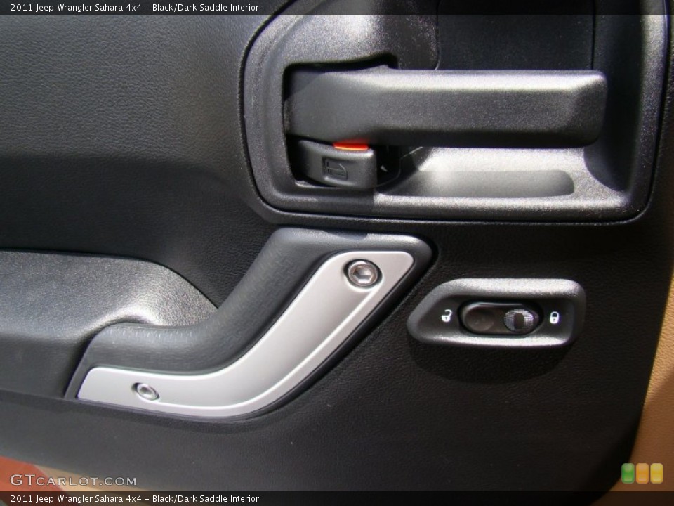 Black/Dark Saddle Interior Controls for the 2011 Jeep Wrangler Sahara 4x4 #69292458