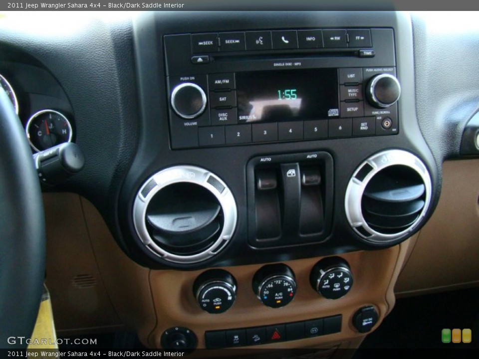 Black/Dark Saddle Interior Controls for the 2011 Jeep Wrangler Sahara 4x4 #69292467