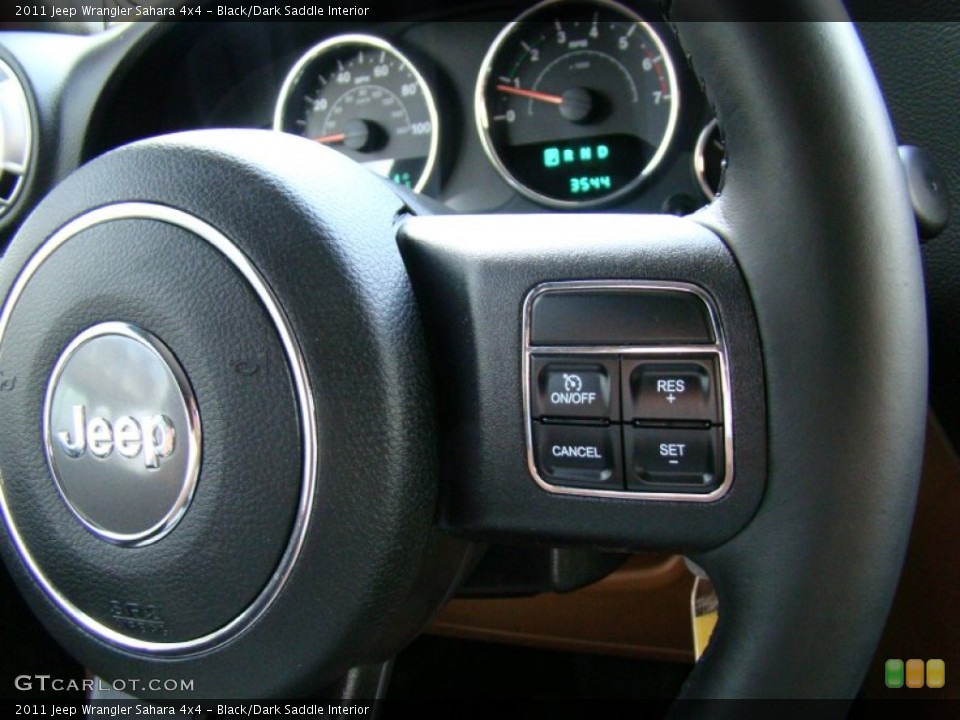 Black/Dark Saddle Interior Controls for the 2011 Jeep Wrangler Sahara 4x4 #69292503