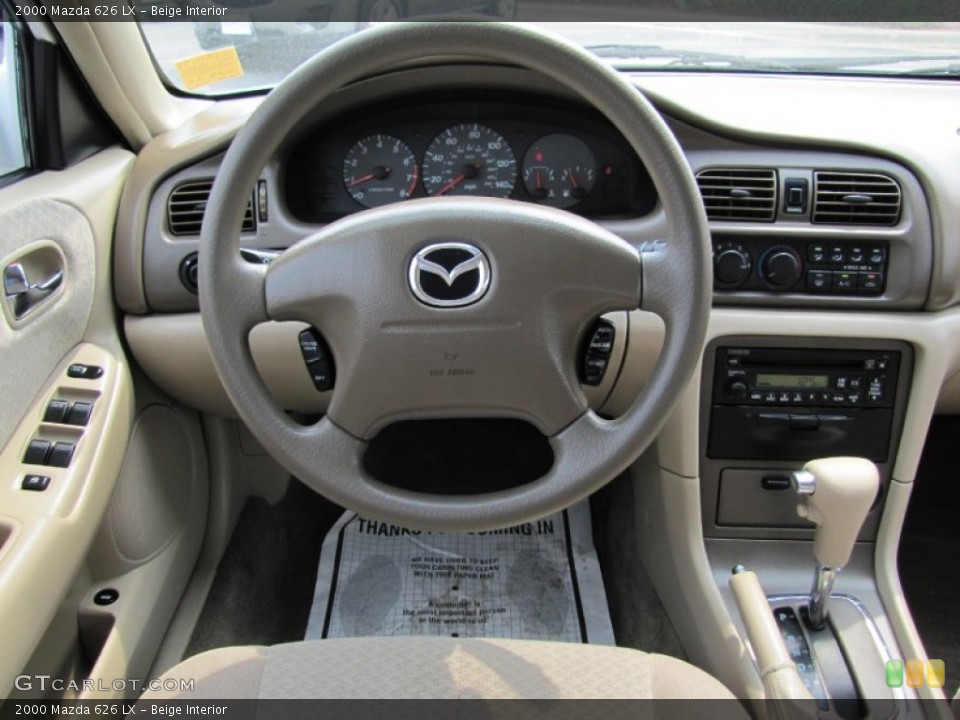 Beige Interior Dashboard for the 2000 Mazda 626 LX #69314976