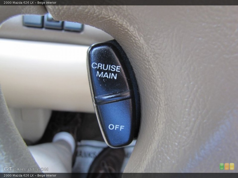 Beige Interior Controls for the 2000 Mazda 626 LX #69315002
