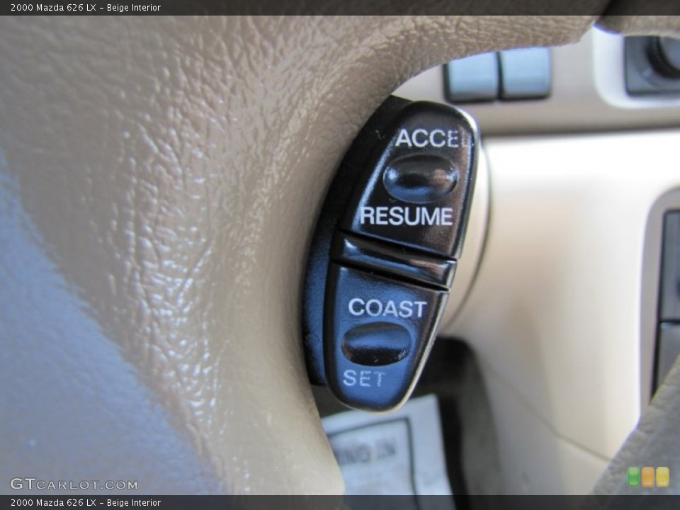 Beige Interior Controls for the 2000 Mazda 626 LX #69315009