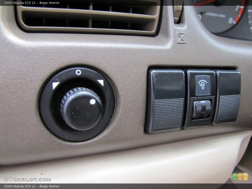 Beige Interior Controls for the 2000 Mazda 626 LX #69315045
