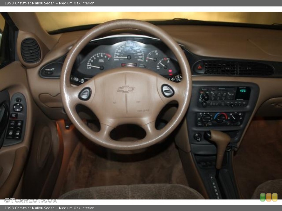 Medium Oak Interior Steering Wheel for the 1998 Chevrolet Malibu Sedan #69340149