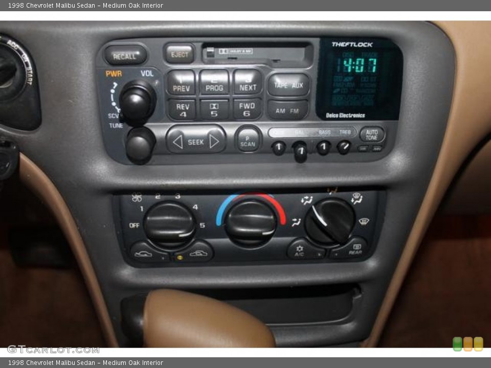 Medium Oak Interior Controls for the 1998 Chevrolet Malibu Sedan #69340227