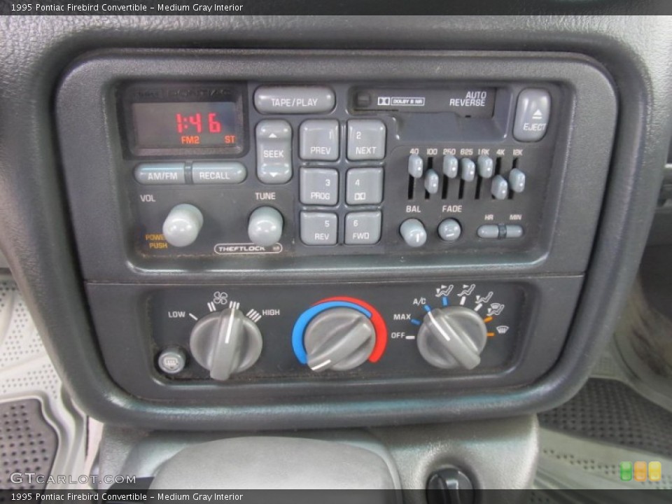 Medium Gray Interior Controls for the 1995 Pontiac Firebird Convertible #69361756