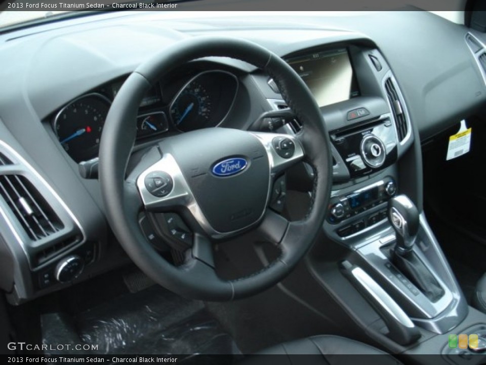 Charcoal Black Interior Dashboard for the 2013 Ford Focus Titanium Sedan #69368548