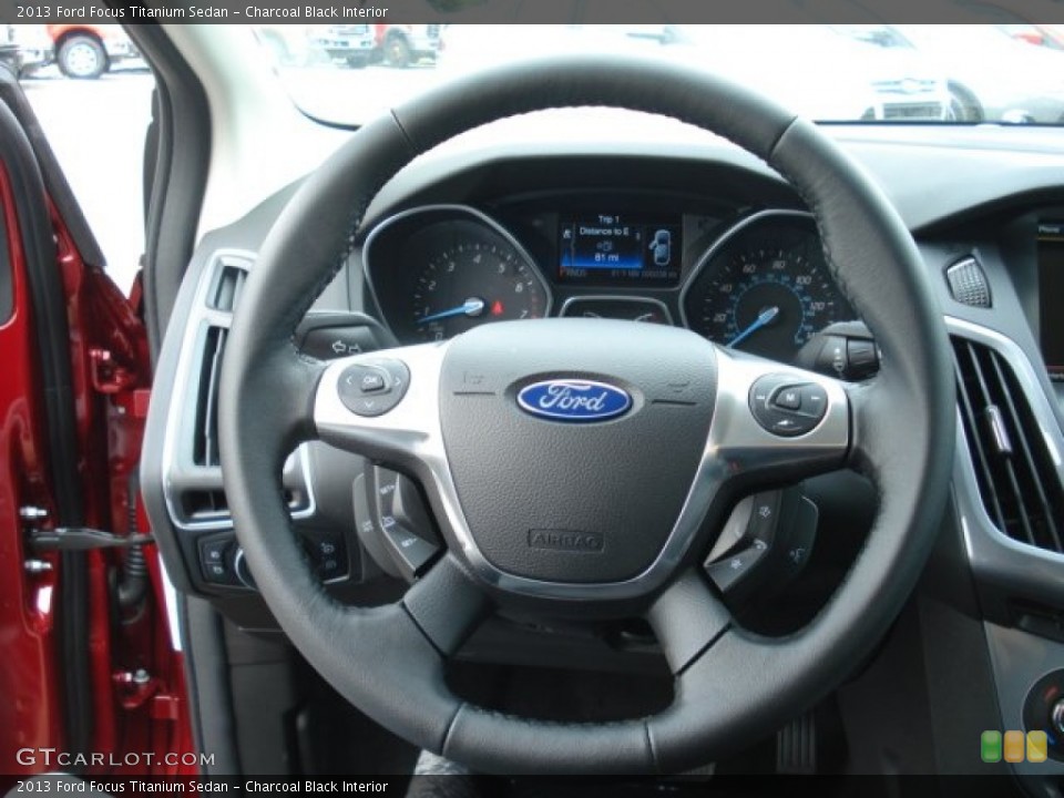 Charcoal Black Interior Steering Wheel for the 2013 Ford Focus Titanium Sedan #69368620