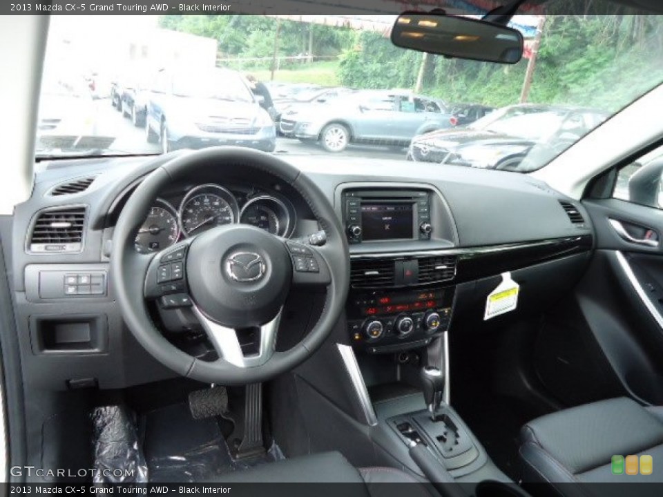 Black Interior Dashboard for the 2013 Mazda CX-5 Grand Touring AWD #69412189