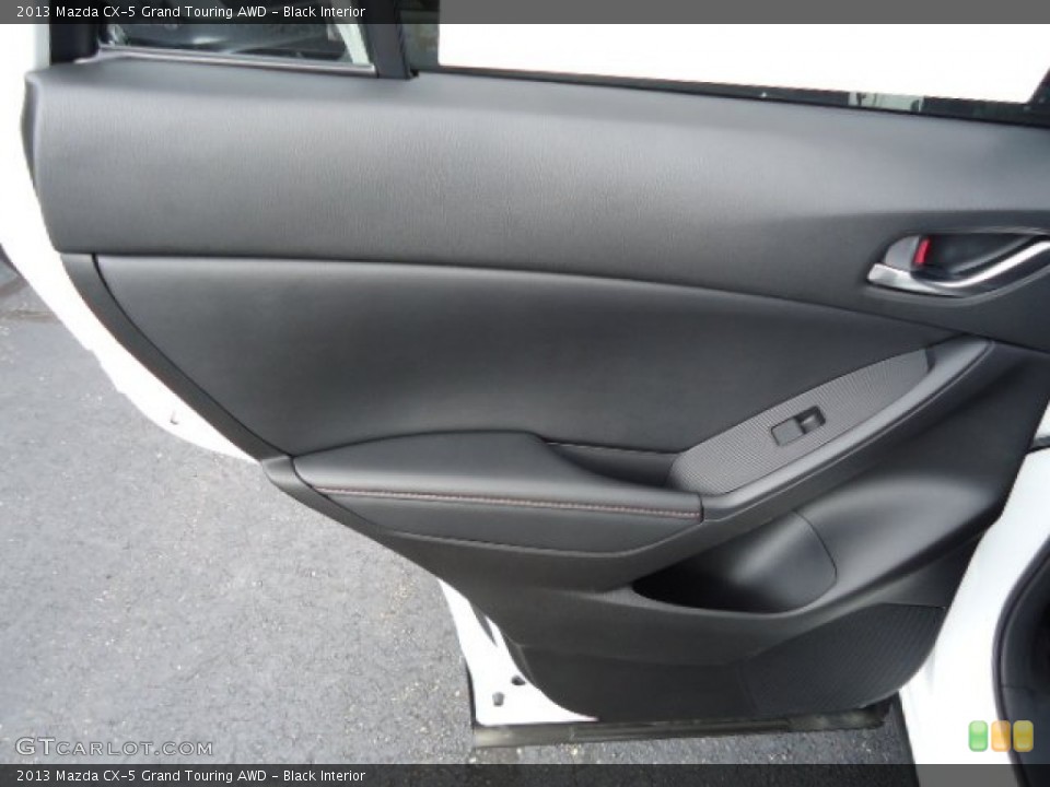 Black Interior Door Panel for the 2013 Mazda CX-5 Grand Touring AWD #69412197