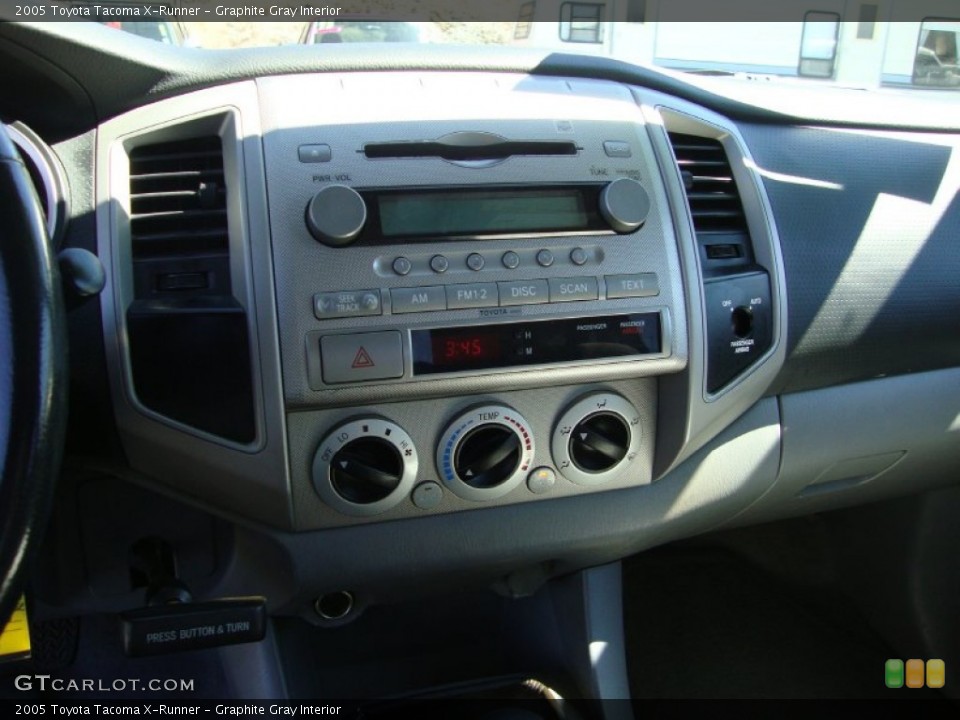 Graphite Gray Interior Controls for the 2005 Toyota Tacoma X-Runner #69413548