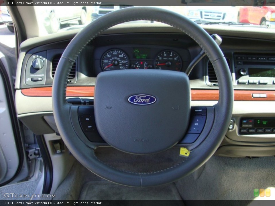 Medium Light Stone Interior Steering Wheel for the 2011 Ford Crown Victoria LX #69416443