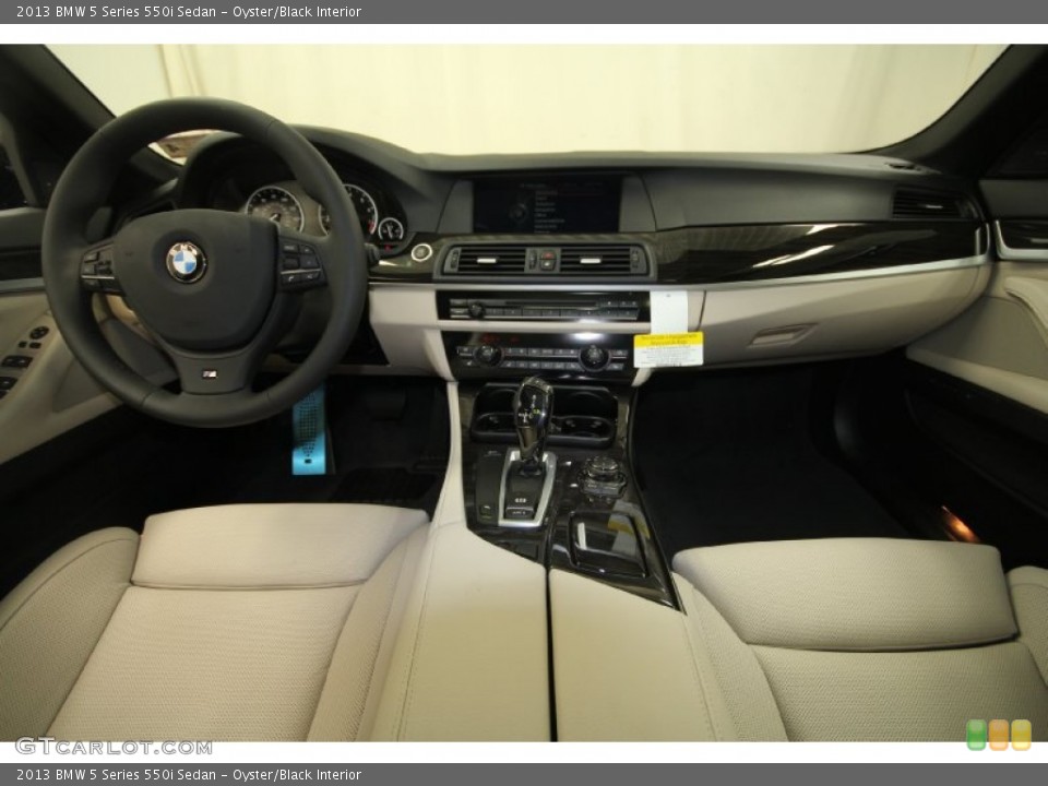 Oyster/Black Interior Dashboard for the 2013 BMW 5 Series 550i Sedan #69434290
