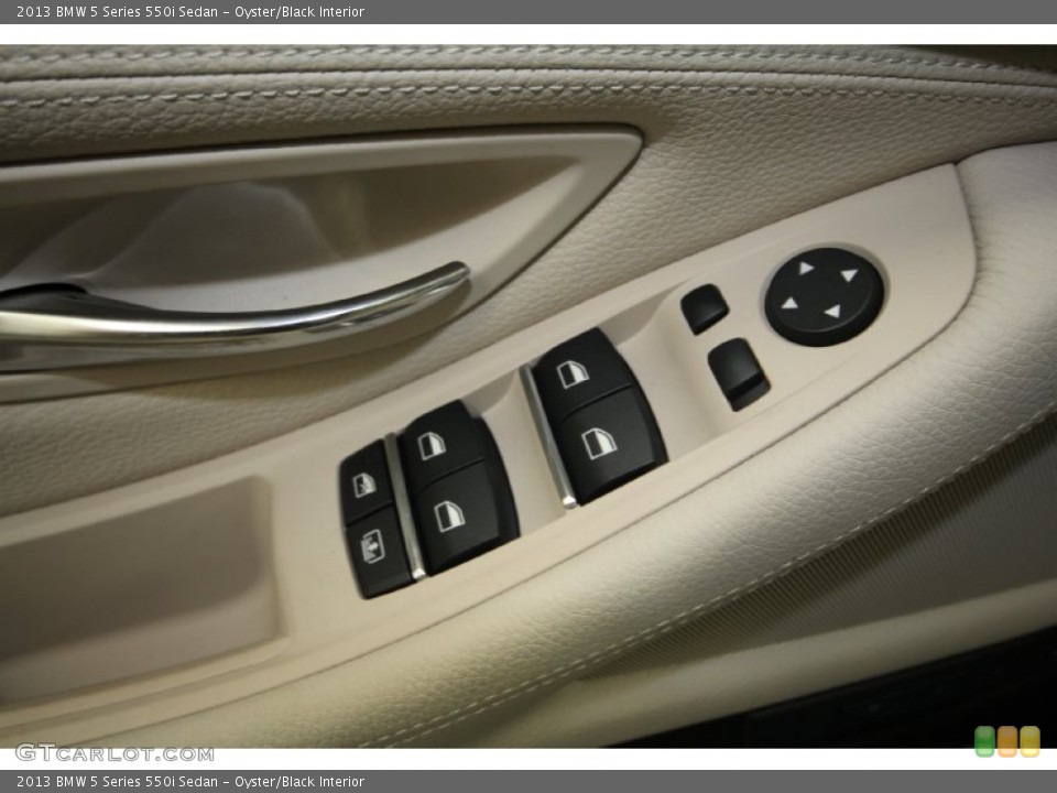 Oyster/Black Interior Controls for the 2013 BMW 5 Series 550i Sedan #69434362