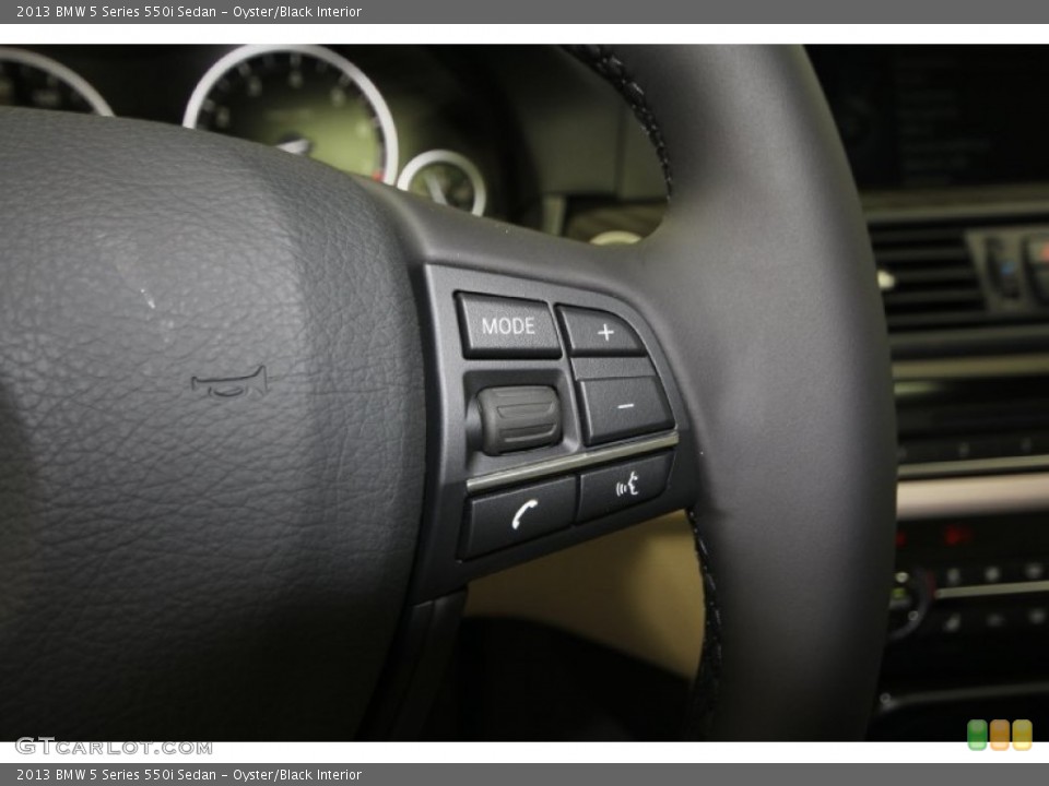 Oyster/Black Interior Controls for the 2013 BMW 5 Series 550i Sedan #69434440