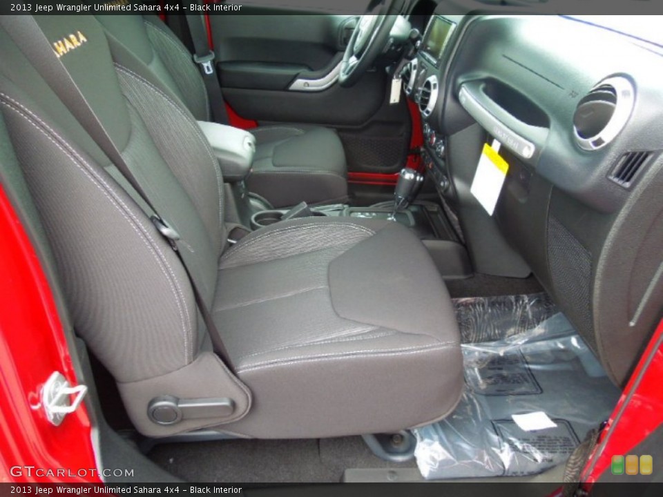 Black Interior Photo for the 2013 Jeep Wrangler Unlimited Sahara 4x4 #69437998