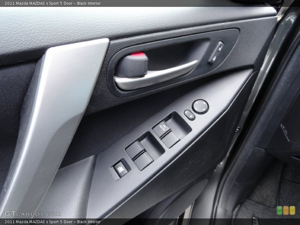 Black Interior Controls for the 2011 Mazda MAZDA3 s Sport 5 Door #69449476