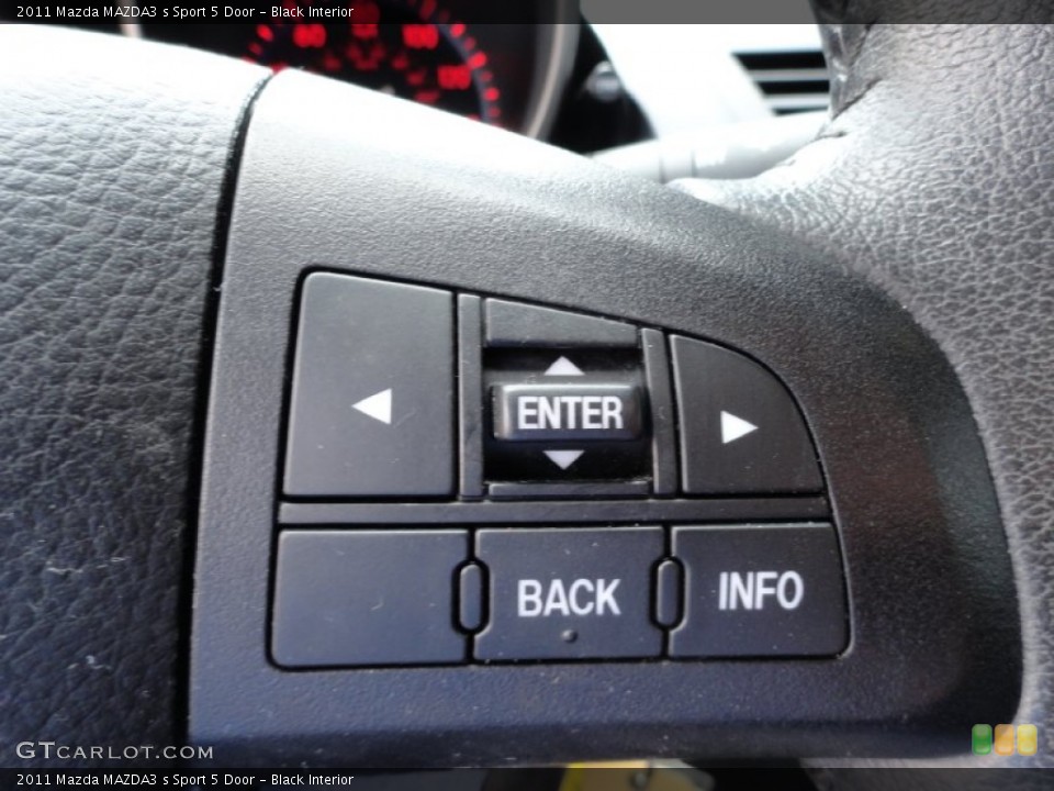 Black Interior Controls for the 2011 Mazda MAZDA3 s Sport 5 Door #69449521