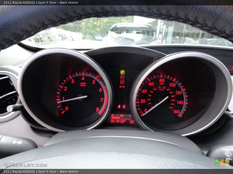 Black Interior Gauges for the 2011 Mazda MAZDA3 s Sport 5 Door #69449545