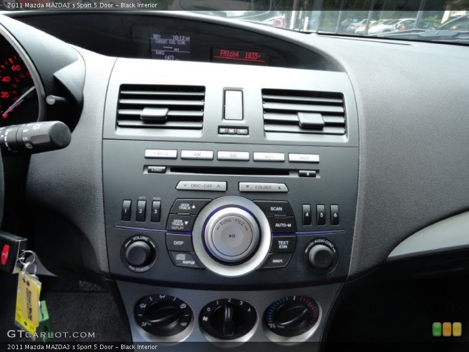 Black Interior Controls for the 2011 Mazda MAZDA3 s Sport 5 Door #69449587