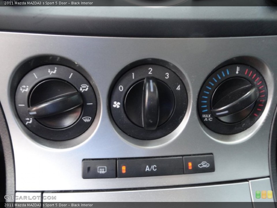 Black Interior Controls for the 2011 Mazda MAZDA3 s Sport 5 Door #69449608
