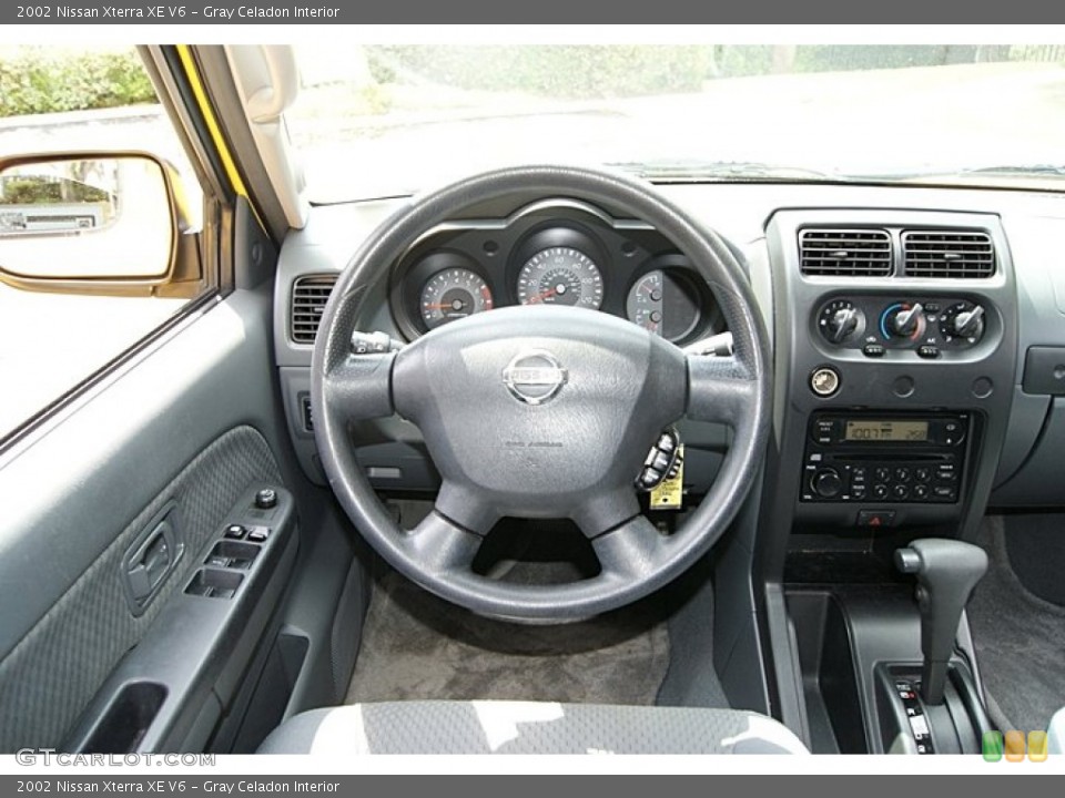 Gray Celadon Interior Steering Wheel For The 2002 Nissan