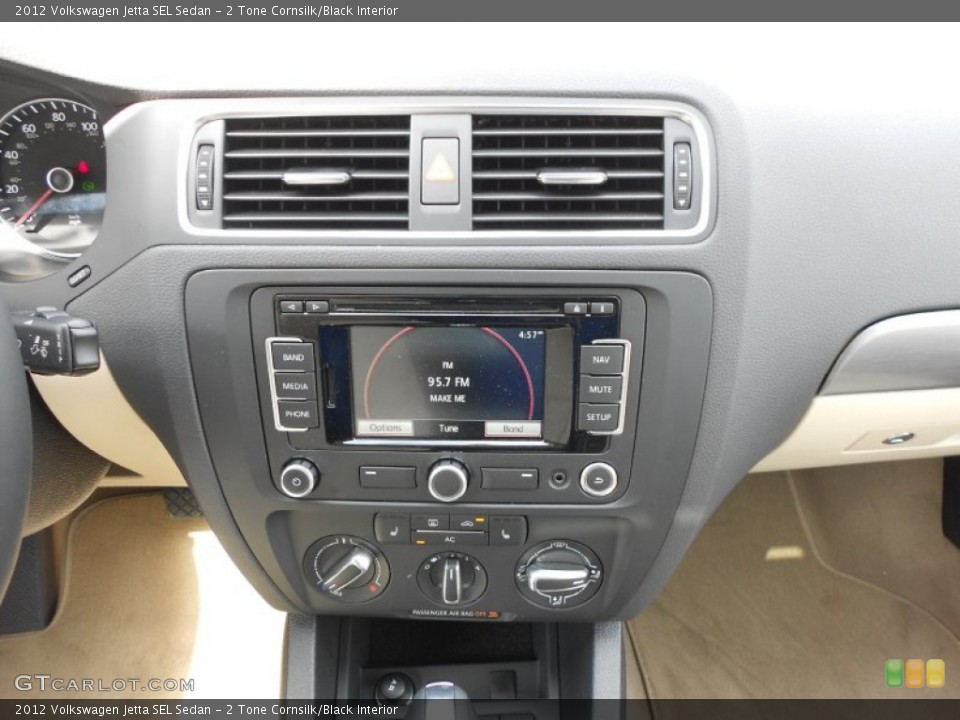 2 Tone Cornsilk/Black Interior Controls for the 2012 Volkswagen Jetta SEL Sedan #69494875