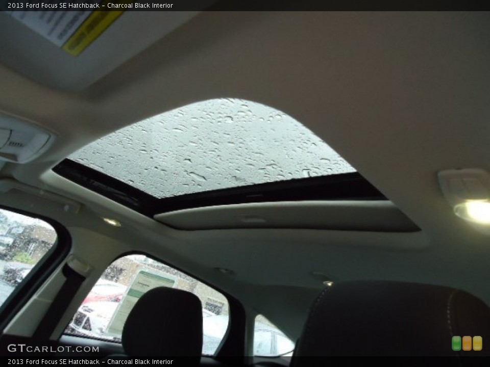 Charcoal Black Interior Sunroof for the 2013 Ford Focus SE Hatchback #69530856