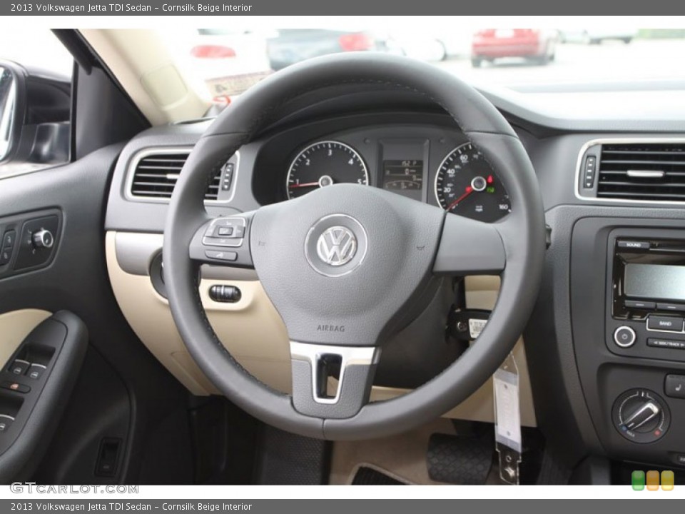 Cornsilk Beige Interior Steering Wheel for the 2013 Volkswagen Jetta TDI Sedan #69542559