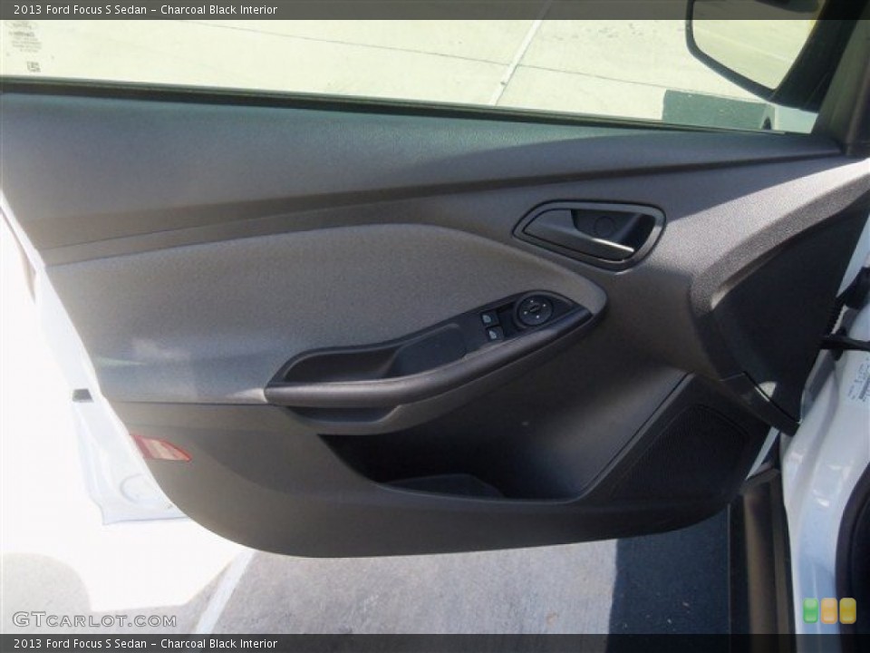 Charcoal Black Interior Door Panel for the 2013 Ford Focus S Sedan #69545310