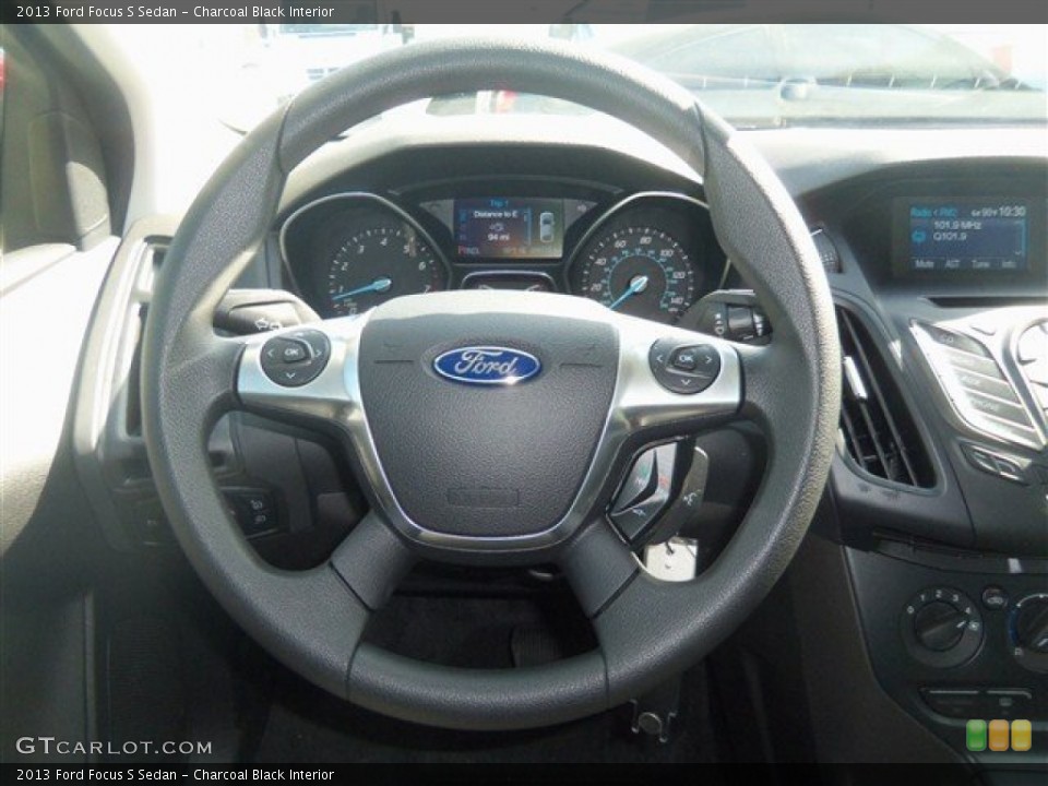 Charcoal Black Interior Steering Wheel for the 2013 Ford Focus S Sedan #69545367