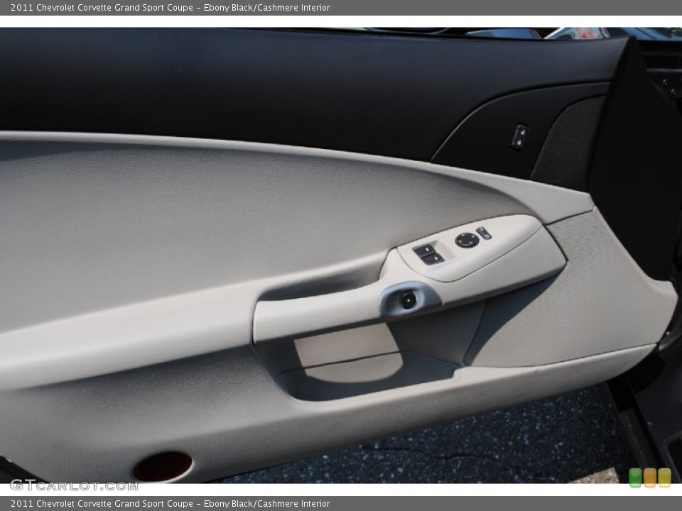 Ebony Black/Cashmere Interior Door Panel for the 2011 Chevrolet Corvette Grand Sport Coupe #69550521