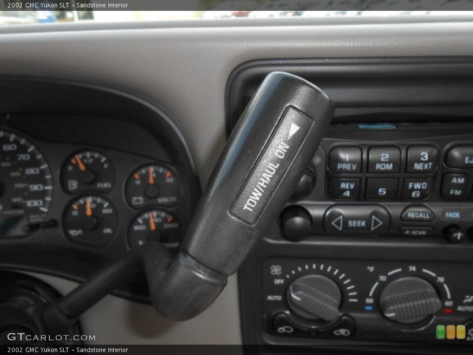 Sandstone Interior Controls for the 2002 GMC Yukon SLT #69559140
