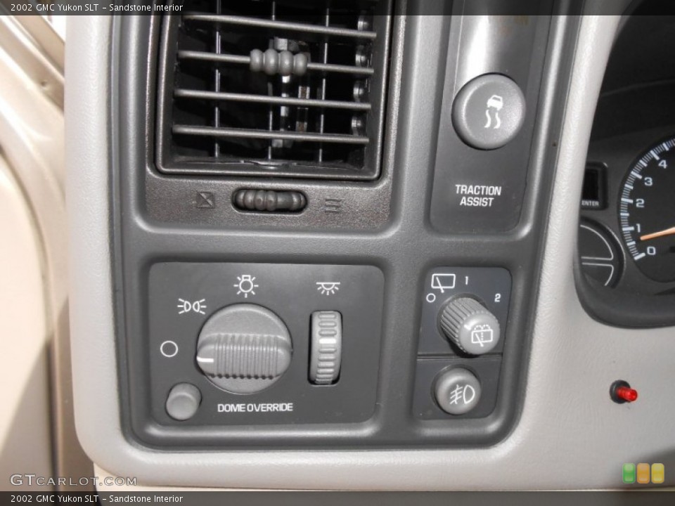 Sandstone Interior Controls for the 2002 GMC Yukon SLT #69559152