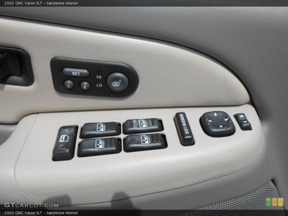 Sandstone Interior Controls for the 2002 GMC Yukon SLT #69559159