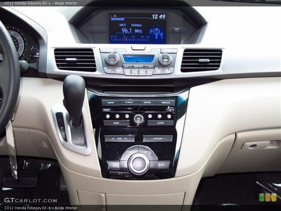 Beige Interior Controls for the 2012 Honda Odyssey EX-L #69560799