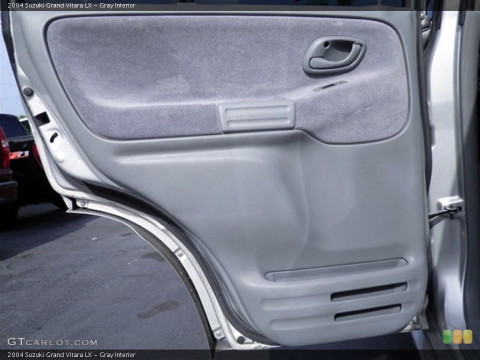 Gray Interior Door Panel for the 2004 Suzuki Grand Vitara LX #69565488