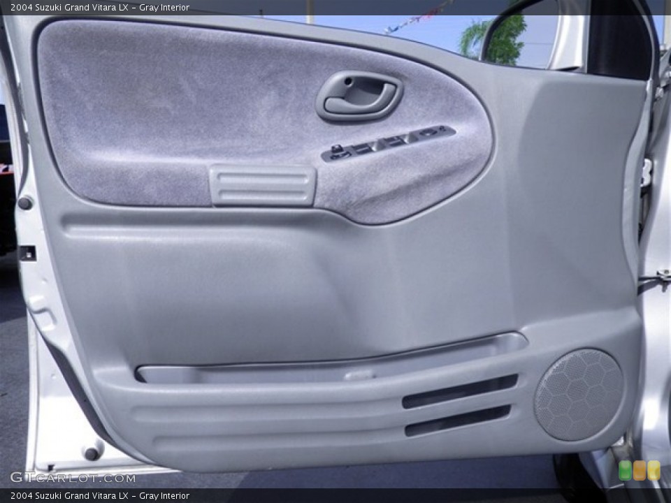 Gray Interior Door Panel for the 2004 Suzuki Grand Vitara LX #69565497