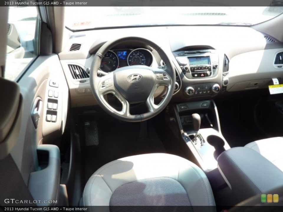 Taupe Interior Dashboard for the 2013 Hyundai Tucson GLS AWD #69574143