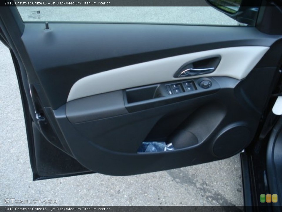 Jet Black/Medium Titanium Interior Door Panel for the 2013 Chevrolet Cruze LS #69623929