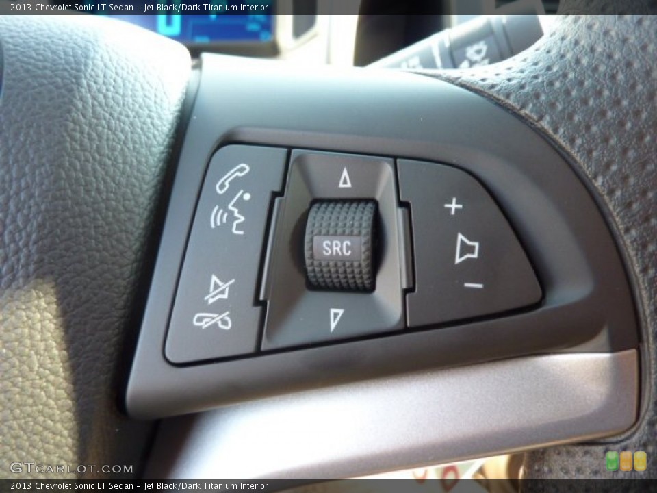 Jet Black/Dark Titanium Interior Controls for the 2013 Chevrolet Sonic LT Sedan #69624529