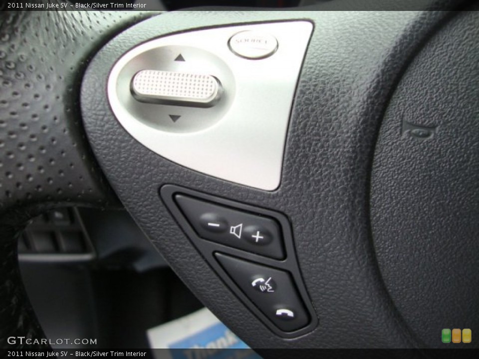 Black/Silver Trim Interior Controls for the 2011 Nissan Juke SV #69643467